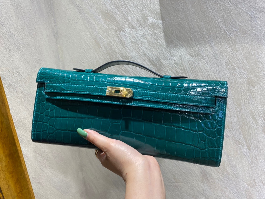 HERMES KELLY CUT 31 IN PINE GREEN SHINNY ALLIGATOR LEATHER WITH GOLD HARDWARE