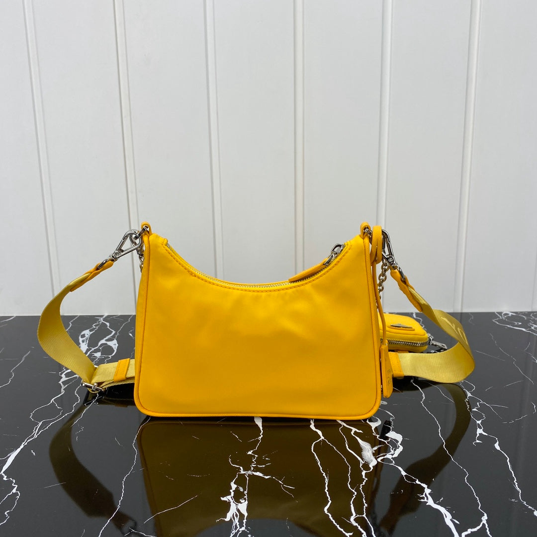 PRADA HOBO 22 BAG IN AMBER YELLOW RE-NYLON