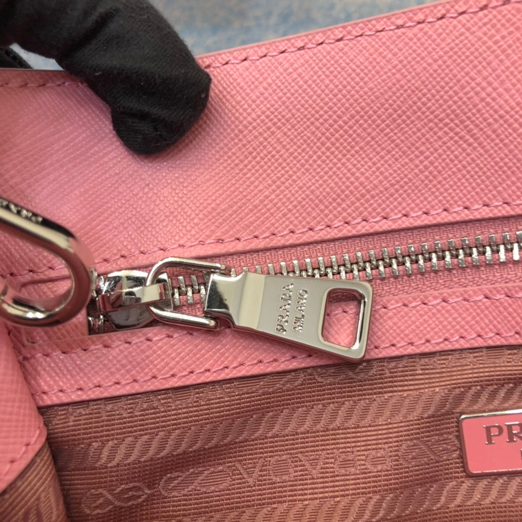 PRADA MINI 23 BAG IN PETAL PINK SAFFIANO LEATHER