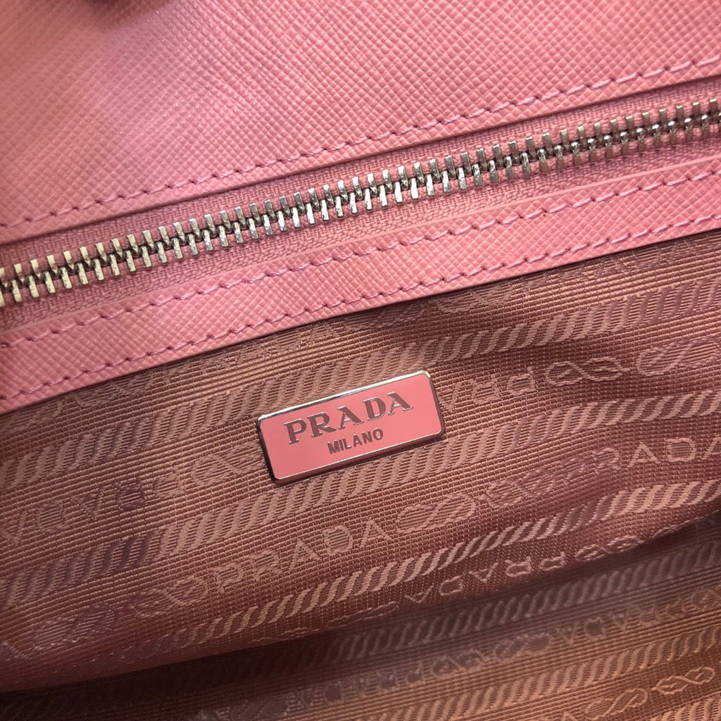 PRADA MINI 23 BAG IN PETAL PINK SAFFIANO LEATHER