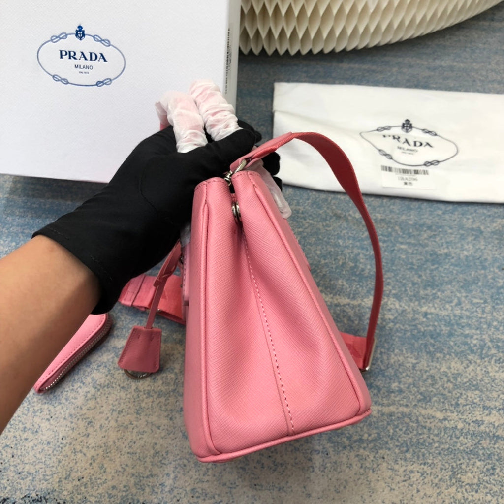 PRADA MINI 23 BAG IN PETAL PINK SAFFIANO LEATHER