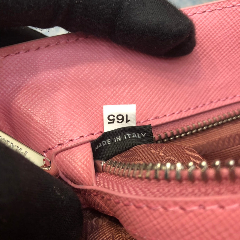 PRADA MINI 23 BAG IN PETAL PINK SAFFIANO LEATHER