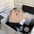CHANEL GRABRIELLE SMALL 24 BACKPACK IN ALMOND BEIGE MIX BLACK CALFSKIN
