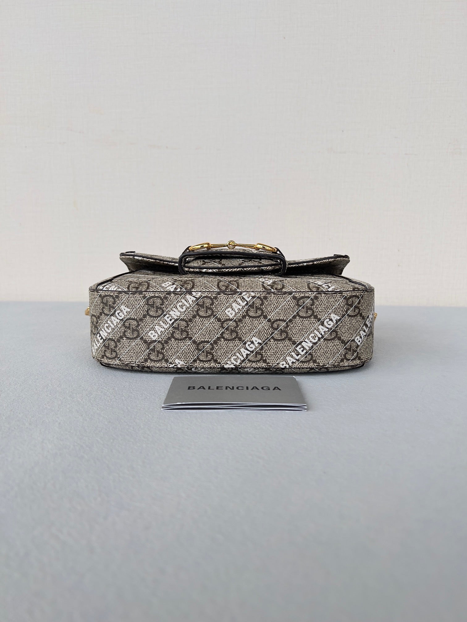 GUCCI MINI 25 PRINTED SADDLE BAG IN EICRU BEIGE CANVAS
