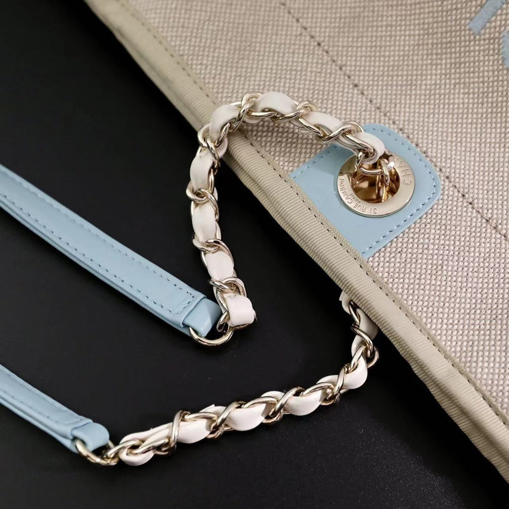 CHANEL DEAUVILLE LARGE 39 TOTE BAG IN BEIGE CANVAS WITH LIGHT BLUE CHAIN