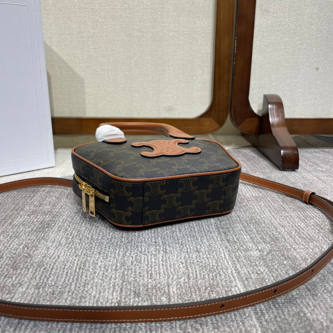 CELINE TOP HANDLE BAG 20 IN BLACK TRIOMPHE CANVAS AND BROWN CALFSKIN