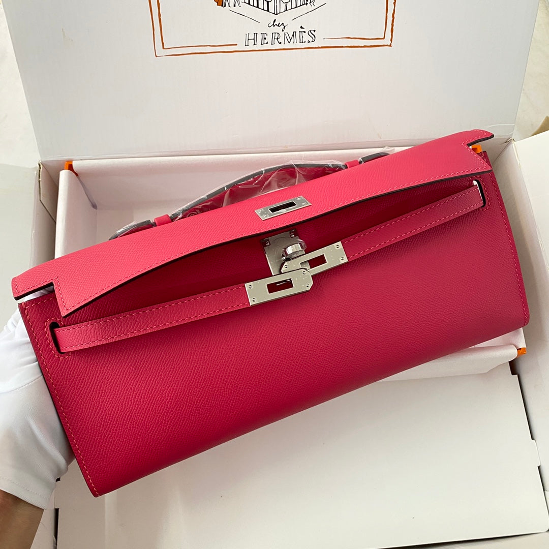 HERMES KELLY CUT 31 IN CHERRY RED CALFSKIN WITH SILVER HARDWARE