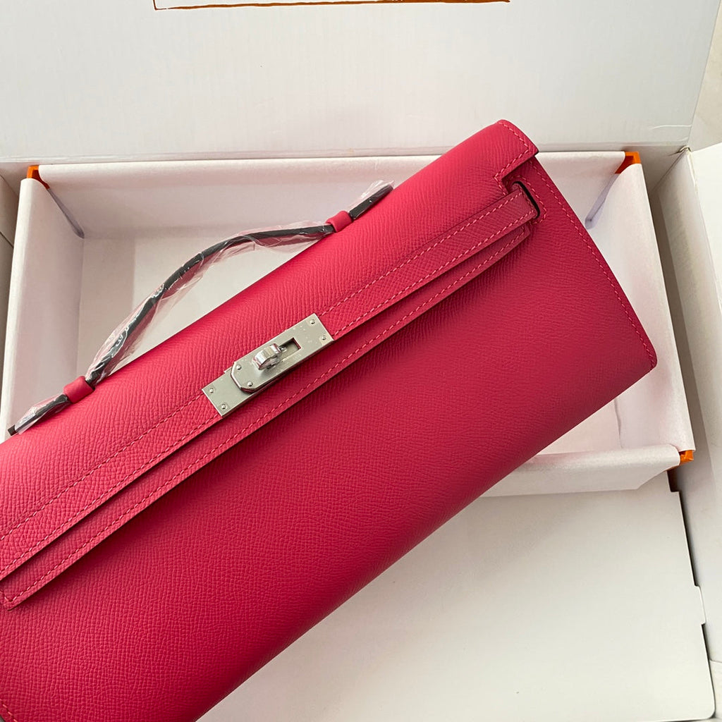 HERMES KELLY CUT 31 IN CHERRY RED CALFSKIN WITH SILVER HARDWARE