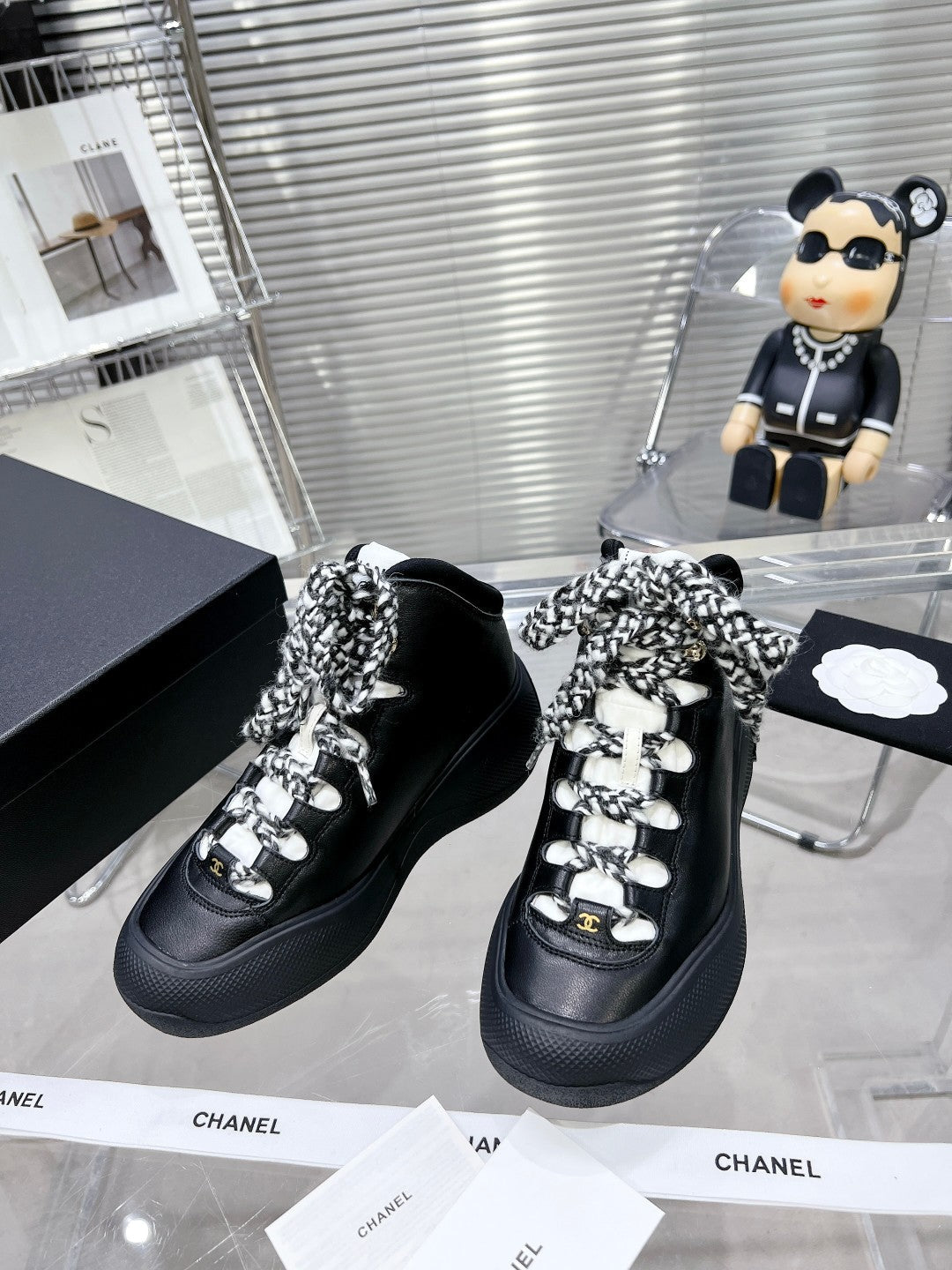 CHANEL CANO ALTO SNEAKER IN BLACK CALFSKIN AND RUBBER