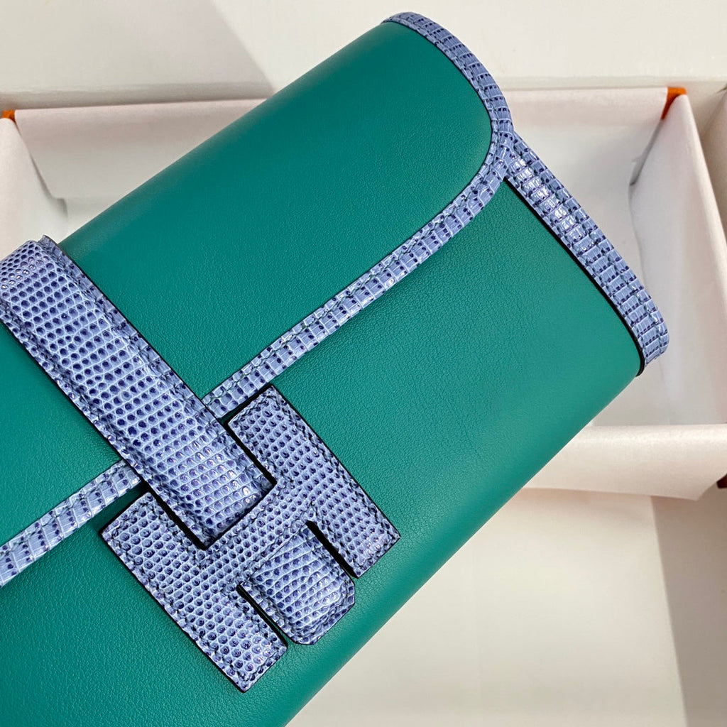 HERMES JIGE ELAN 29 CLUTCH IN TEAL GREEN CALFSKIN WITH ROYAL BLUE LIZARD SKIN