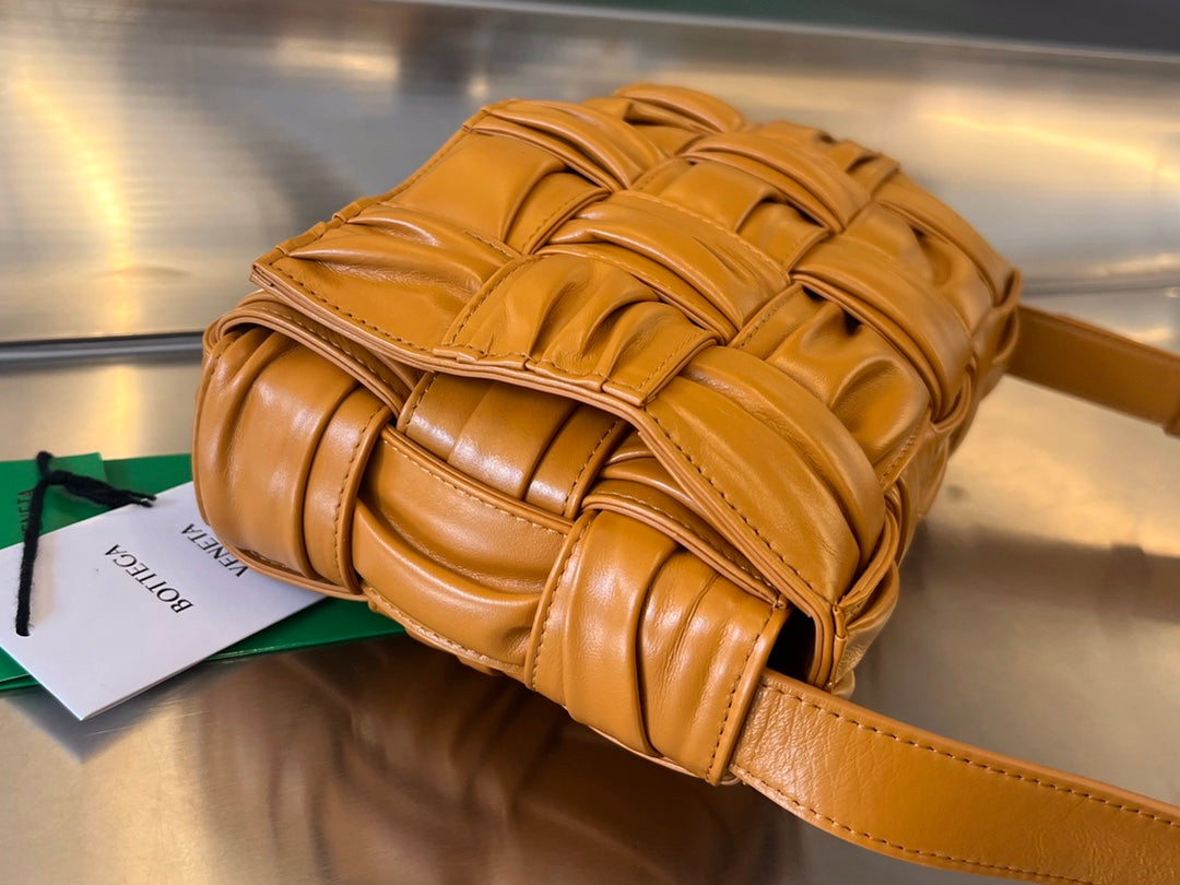 BOTTEGA VENETA CASSETTE 28 IN SANDSTONE ORANGE SOFT LAMBSKIN