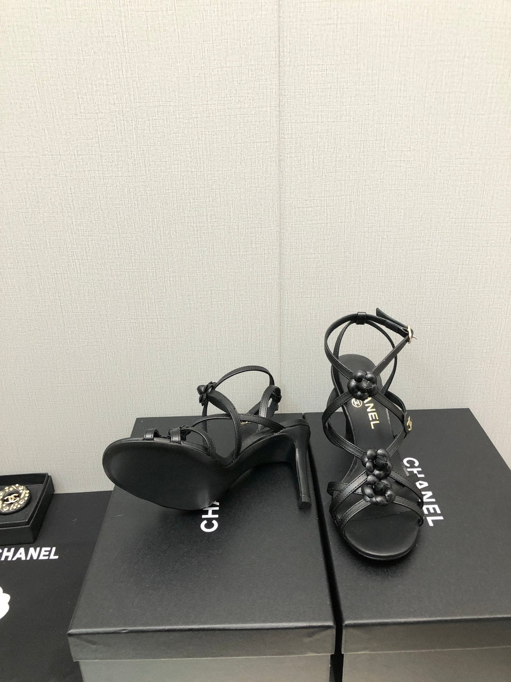 CHANEL FLORAL HIGH HEEL SANDAL IN BLACK LAMBSKIN