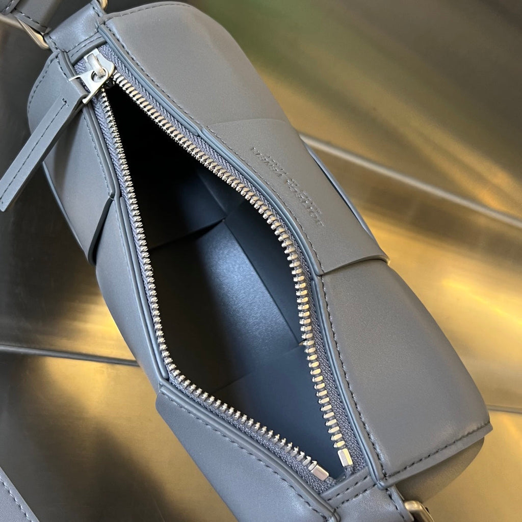 BOTTEGA VENETA SMALL CYLINDER CASSETTE 21 IN LAVA GRAY CALFSKIN