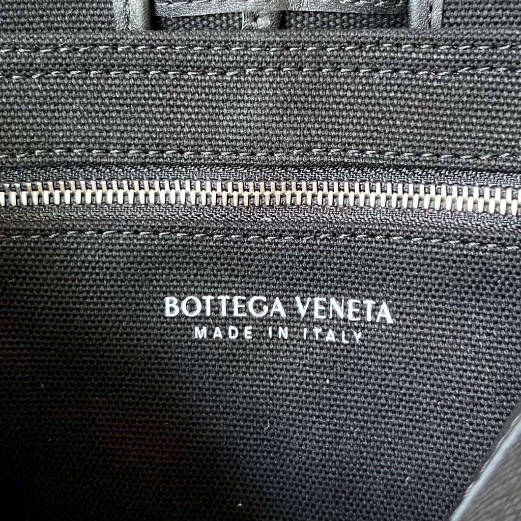 BOTTEGA VENETA SMALL CASSETTE 23 IN BLACK CANVAS AND CALFSKIN TRIM