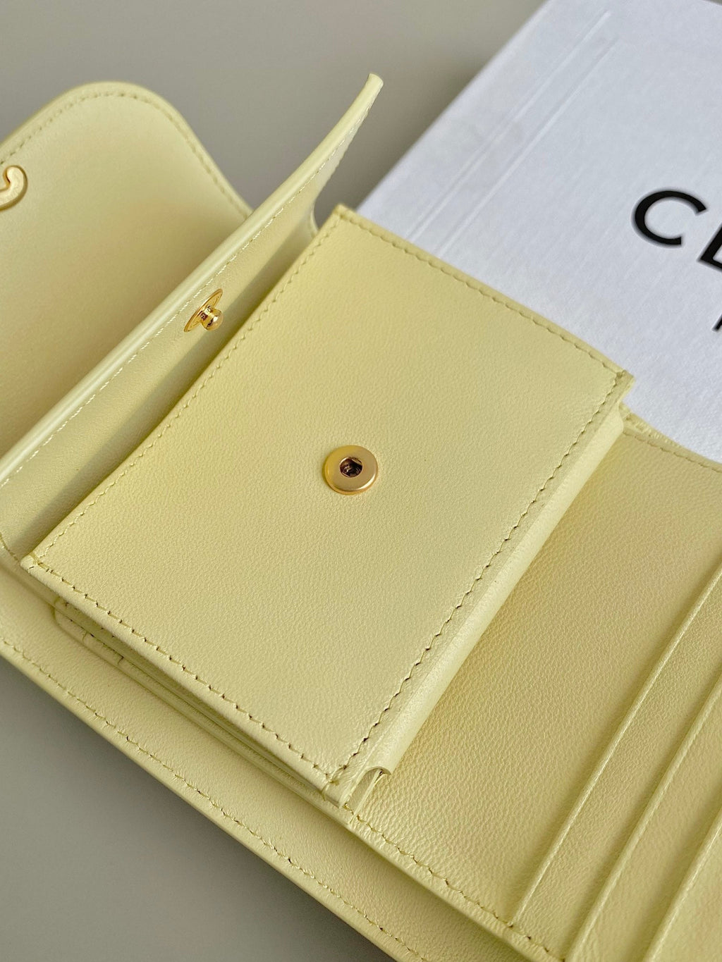 CELINE TRIPHOME 10 TRIFOLD WALLET CALFSKIN YELLOW PASTEL