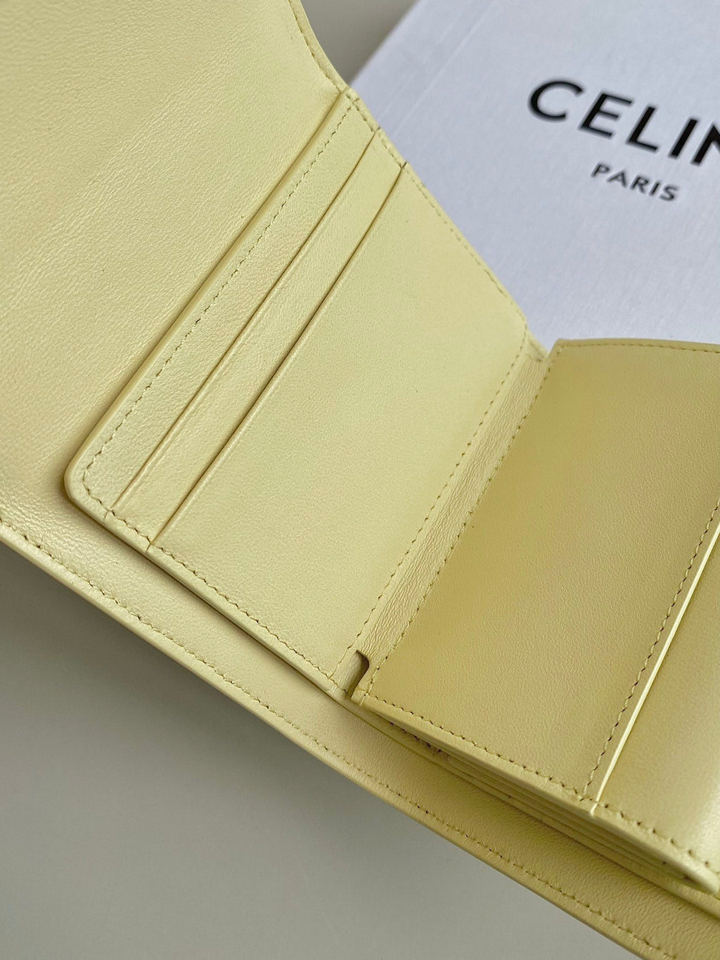 CELINE TRIPHOME 10 TRIFOLD WALLET CALFSKIN YELLOW PASTEL