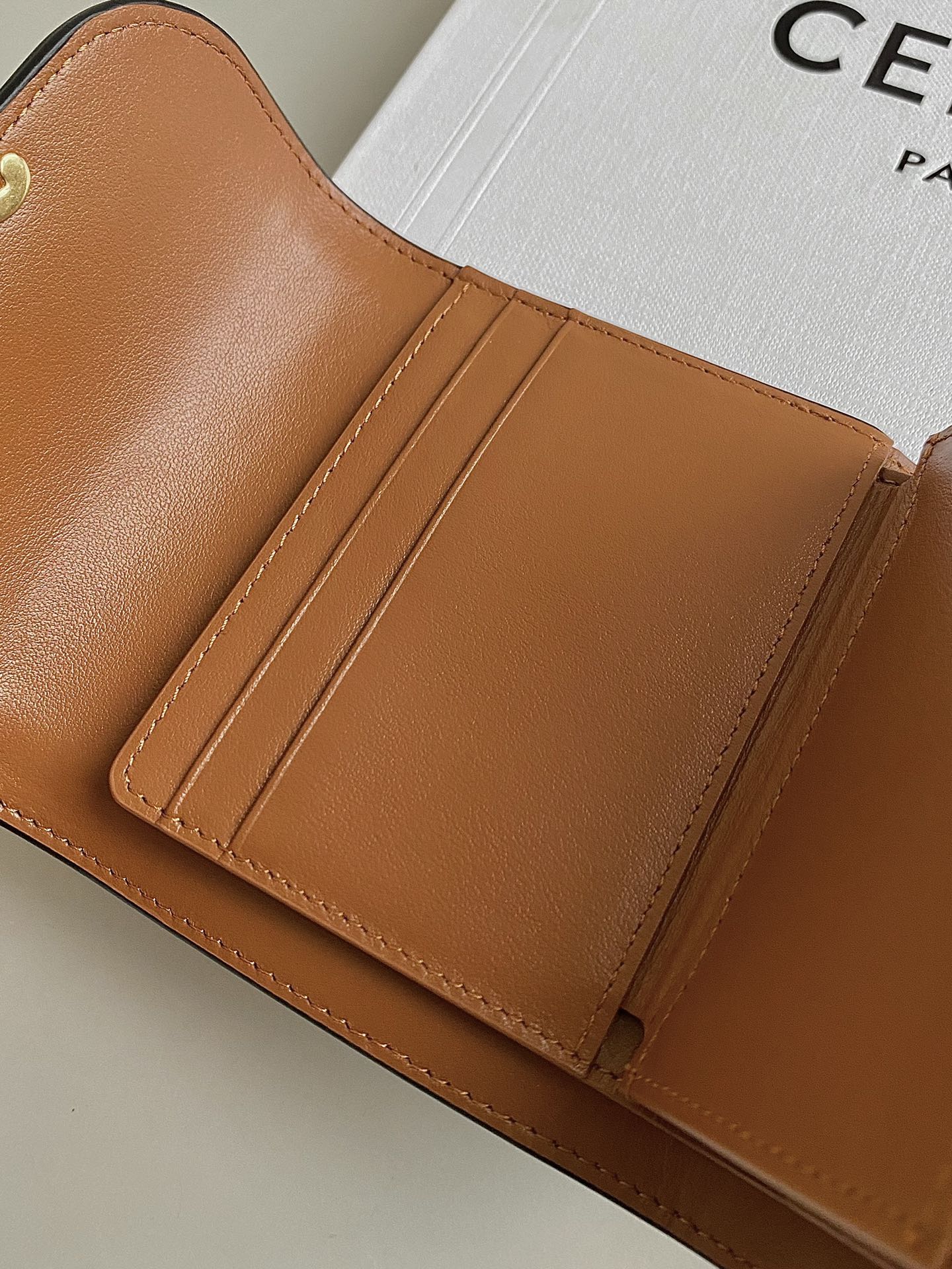 CELINE TRIPHOME 10 TRIFOLD WALLET CALFSKIN AND CANVAS WHITE BROWN