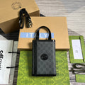 GUCCI CLASP CLUTCH 20 IN BLACK CANVAS AND CALFSKIN