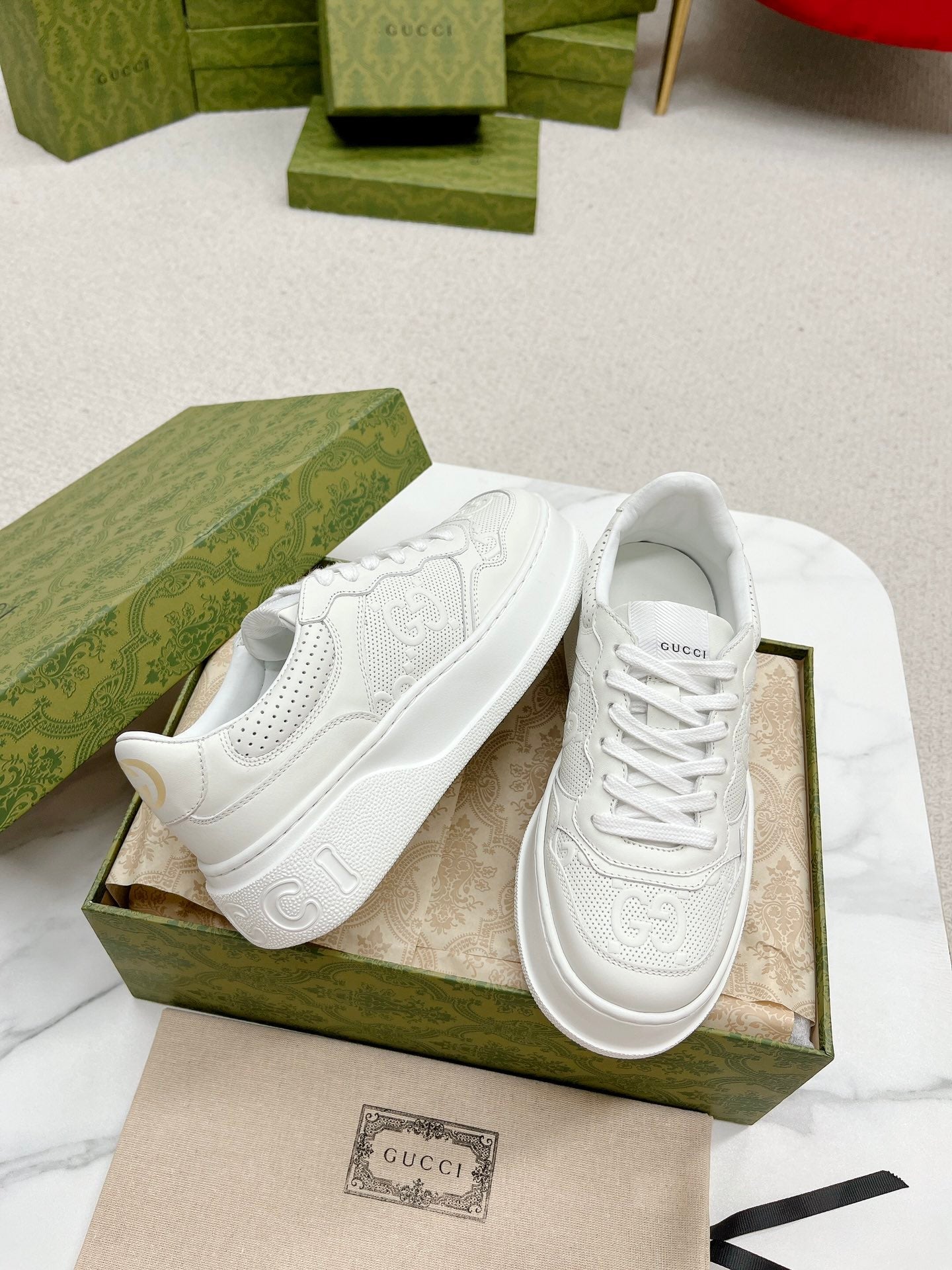 GUCCI EMBOSSED TRAINER WHITE CALFSKIN