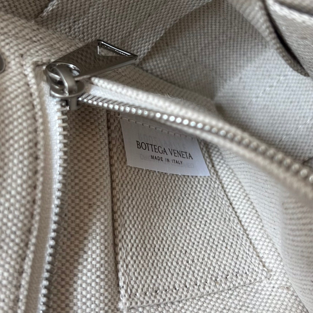 BOTTEGA VENETA MINI CASSETTE 23 IN BLACK WHITE CALFSKIN
