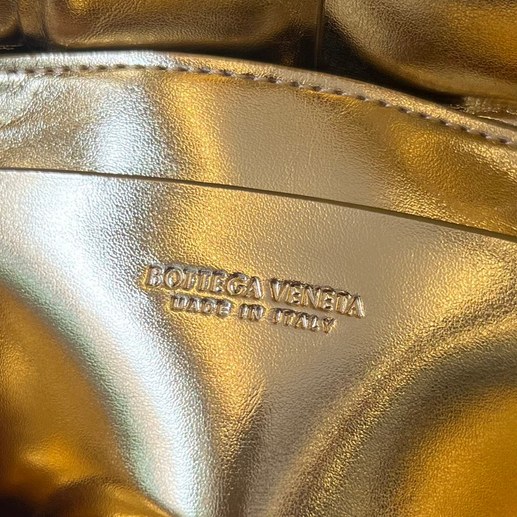 BOTTEGA VENETA MINI CASSETTE 18 IN GOLDEN LAMBSKIN