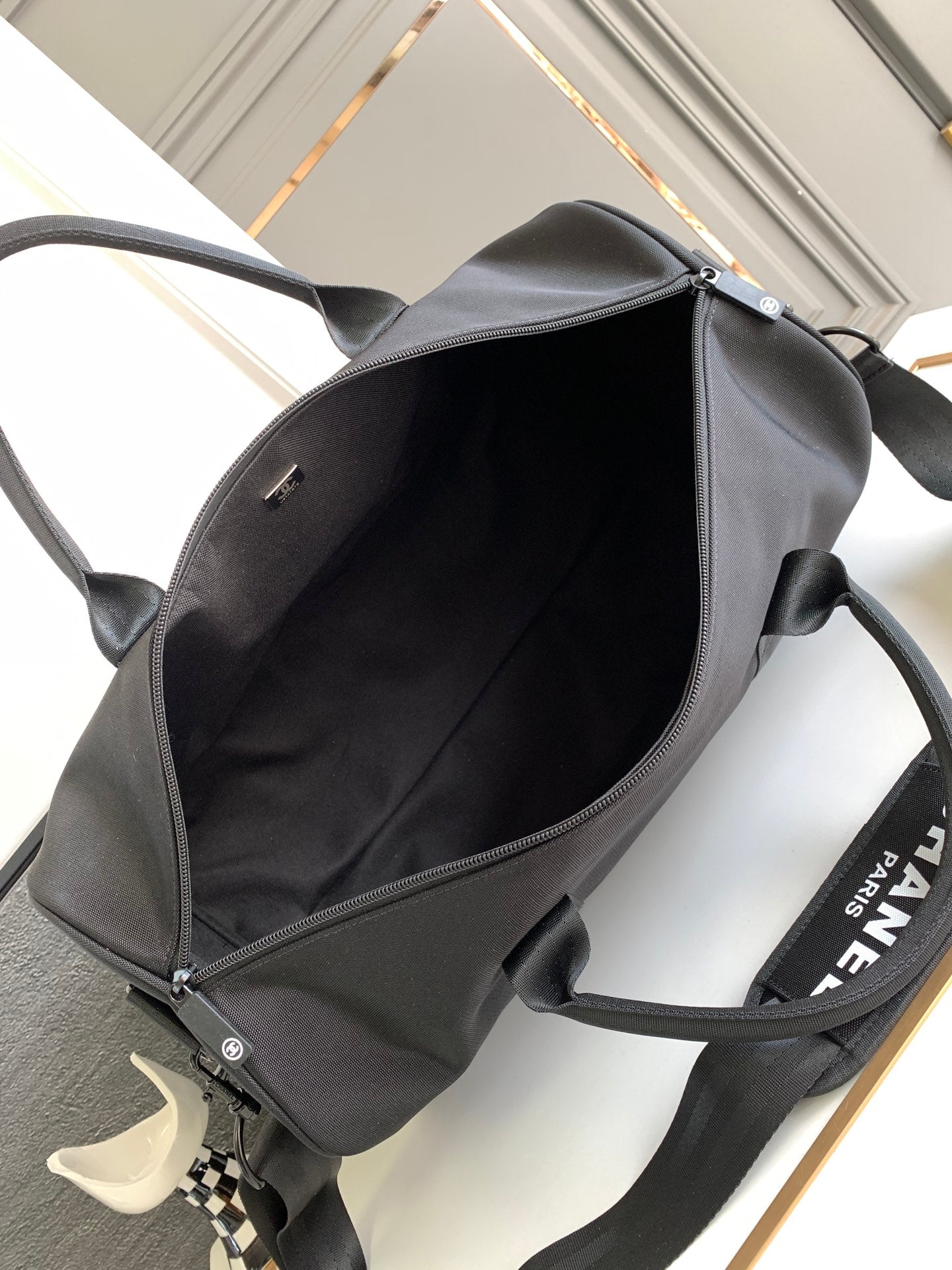 CHANEL TRAVEL BAG 45 IN BLACK CANVAS WITH WHITE LOGO