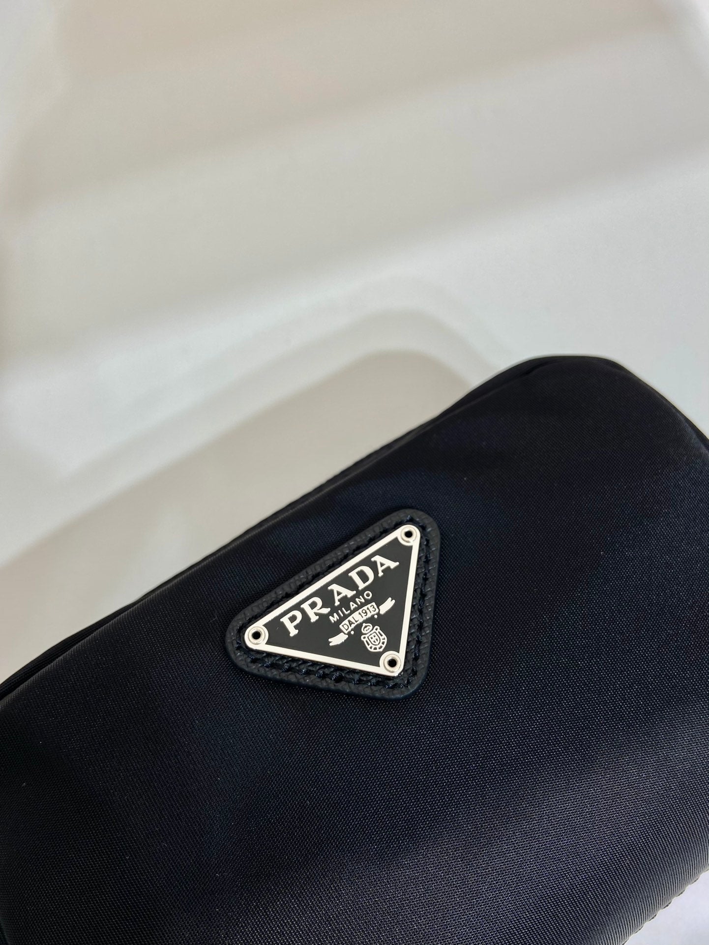 PRADA CLUTCH 12 IN BLACK RE-NYLON