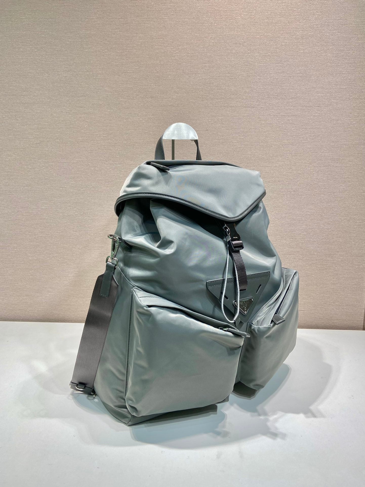 PRADA TRIANGLE LOGO BACKPACK 45 IN ASH GRAY RE-NYLON