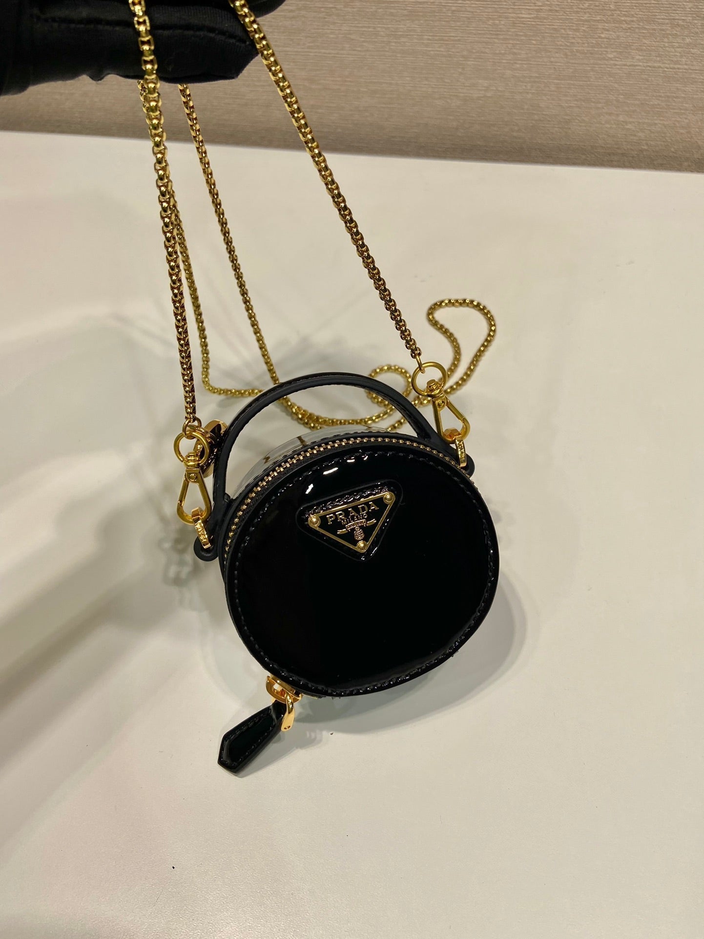 PRADA MINI ROUND BAG 8 IN BLACK GLOSSY CALFSKIN GOLD HARDWARE