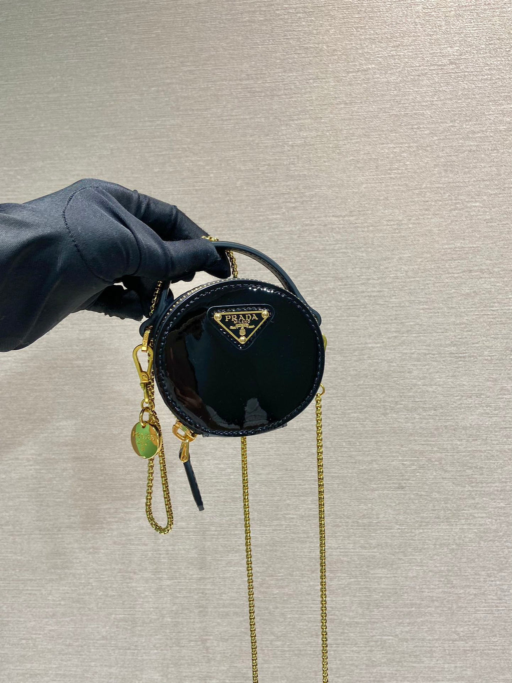 PRADA MINI ROUND BAG 8 IN BLACK GLOSSY CALFSKIN GOLD HARDWARE