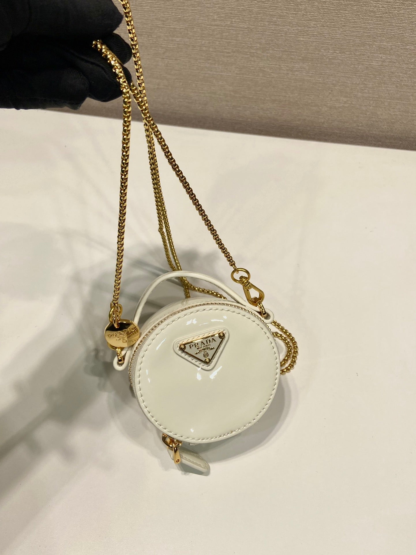 PRADA MINI ROUND BAG 8 IN WHITE GLOSSY CALFSKIN GOLD HARDWARE