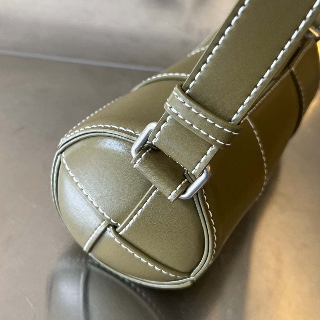 BOTTEGA VENETA SMALL CYLINDER CASSETTE 21 IN TOBACCO BROWN CALFSKIN