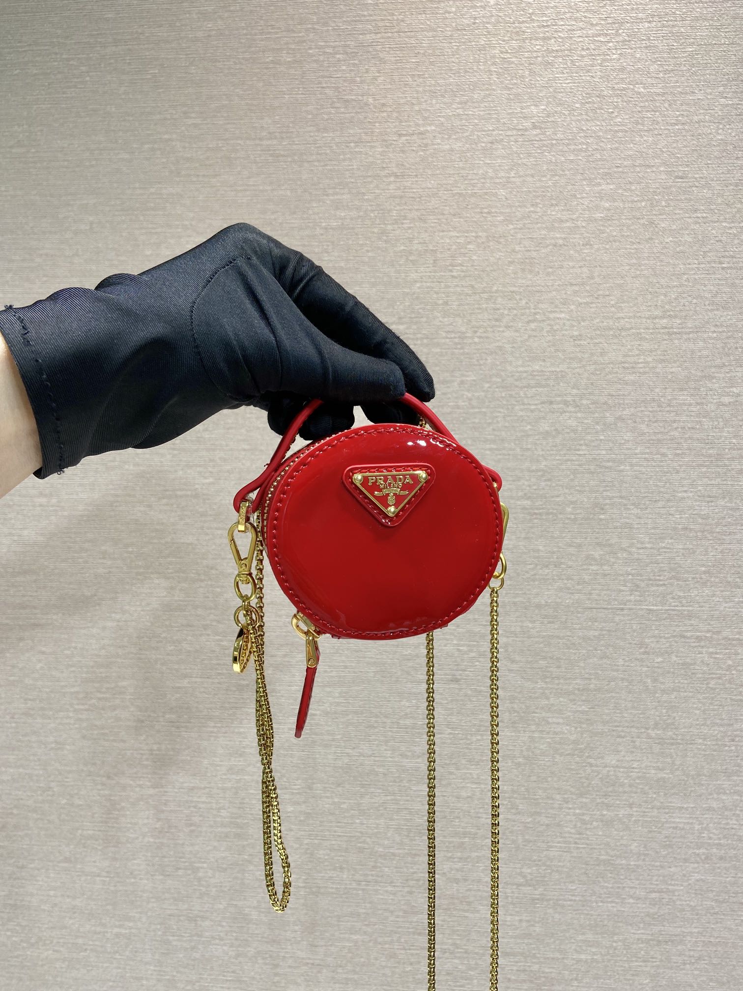 PRADA MINI ROUND BAG 8 IN RED GLOSSY CALFSKIN GOLD HARDWARE