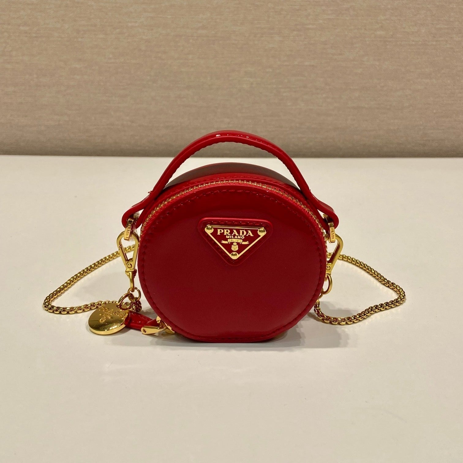 PRADA MINI ROUND BAG 8 IN RED GLOSSY CALFSKIN GOLD HARDWARE