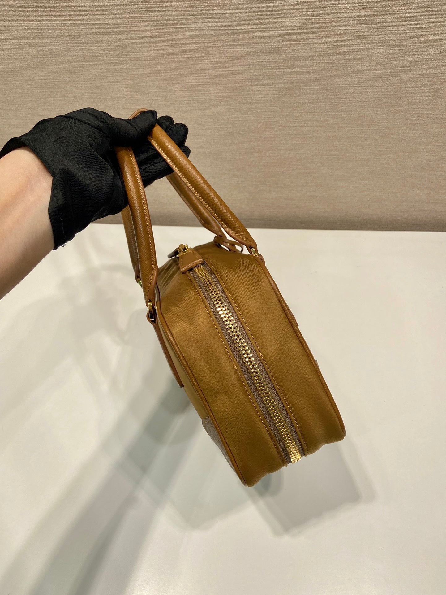 PRADA SMALL TOP HANDLE BAG 25 IN GOLDEN BROWN NYLON AND CALFSKIN TRIM