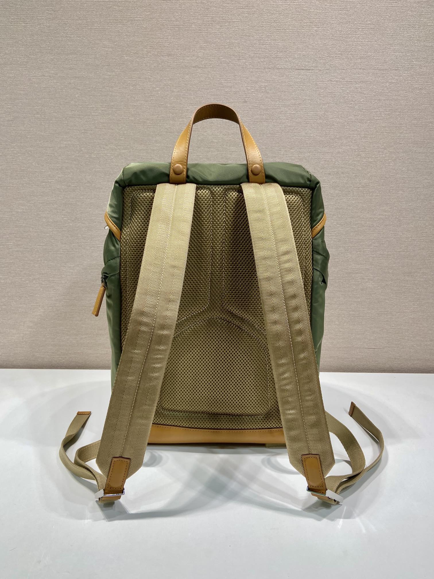 PRADA BACKPACK 45 IN SEAWEED GREEN RE-NYLON AND BROWN CALFSKIN TRIM