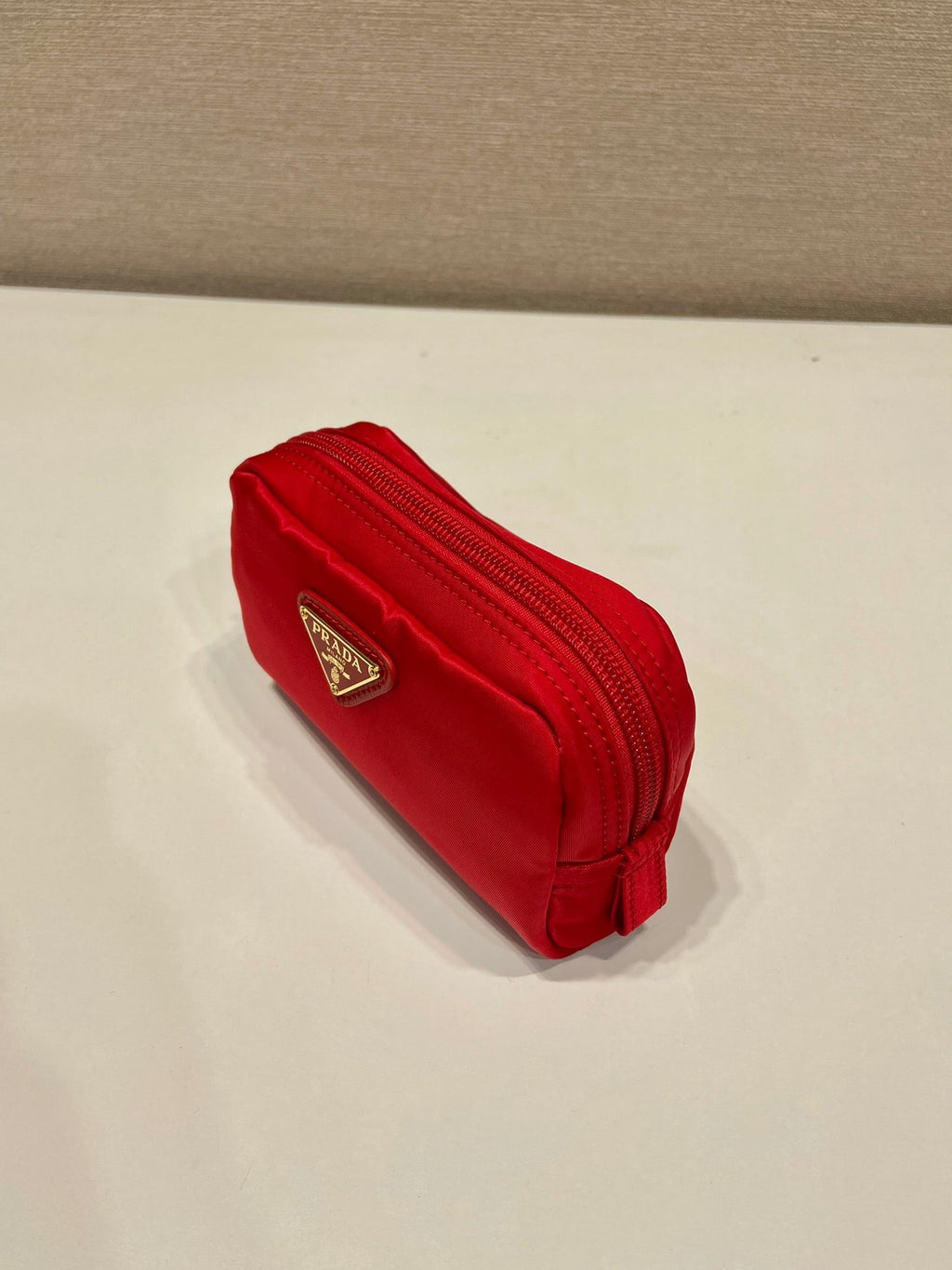 PRADA CLUTCH 12 IN PASSION RED RE-NYLON