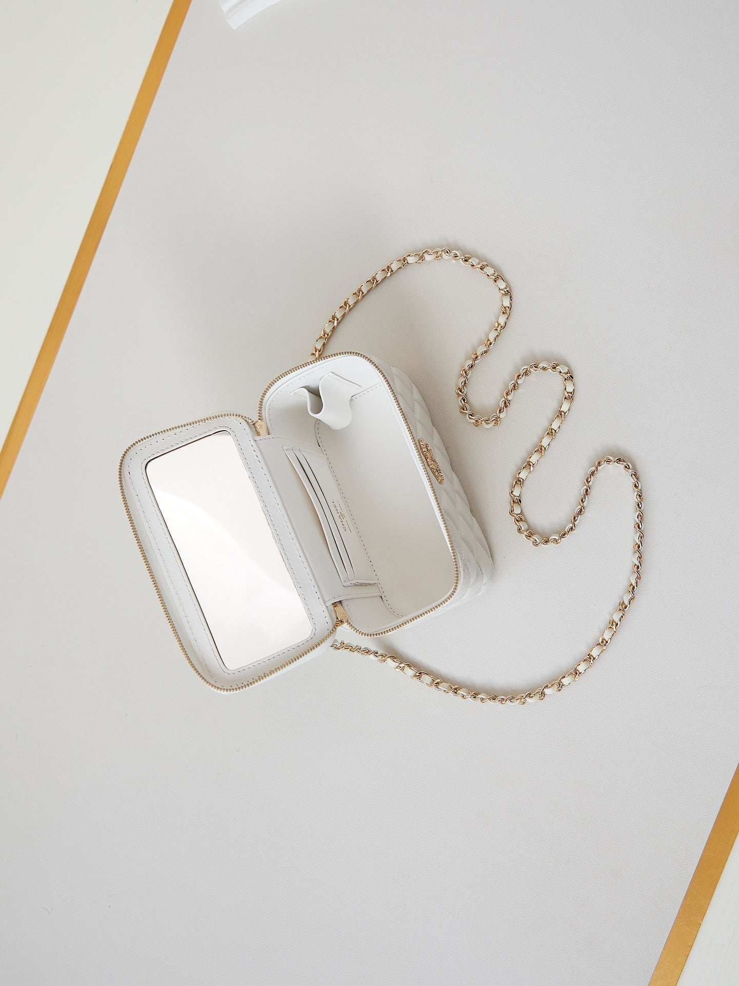 CHANEL 25S MINI VANITY BAG 16 CM IN WHITE LAMBSKIN WITH CRYSTAL-EMBELLISHED  LOGO