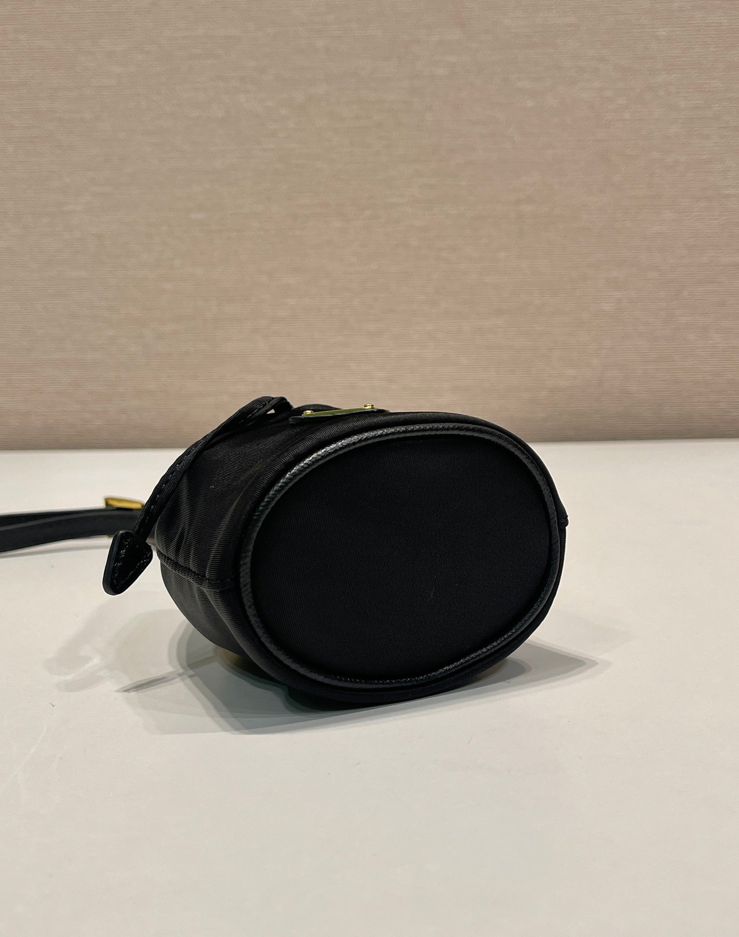 PRADA MINI BUCKET BAG 10 IN BLACK RE-NYLON AND SAFFIANO LEATHER STRAP