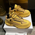 DIOR C'EST SNEAKER IN CLASSIC YELLOW CALFSKIN AND BREATHABLE MESH