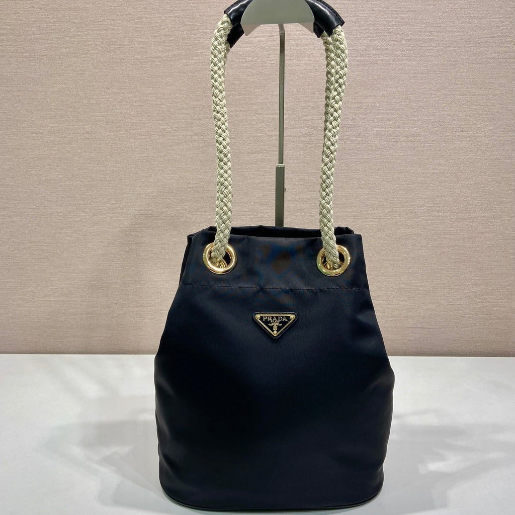 PRADA BUCKET BAG 28 IN BLACK RE-NYLON GOLD LOGO