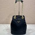 PRADA BUCKET BAG 28 IN BLACK RE-NYLON GOLD LOGO