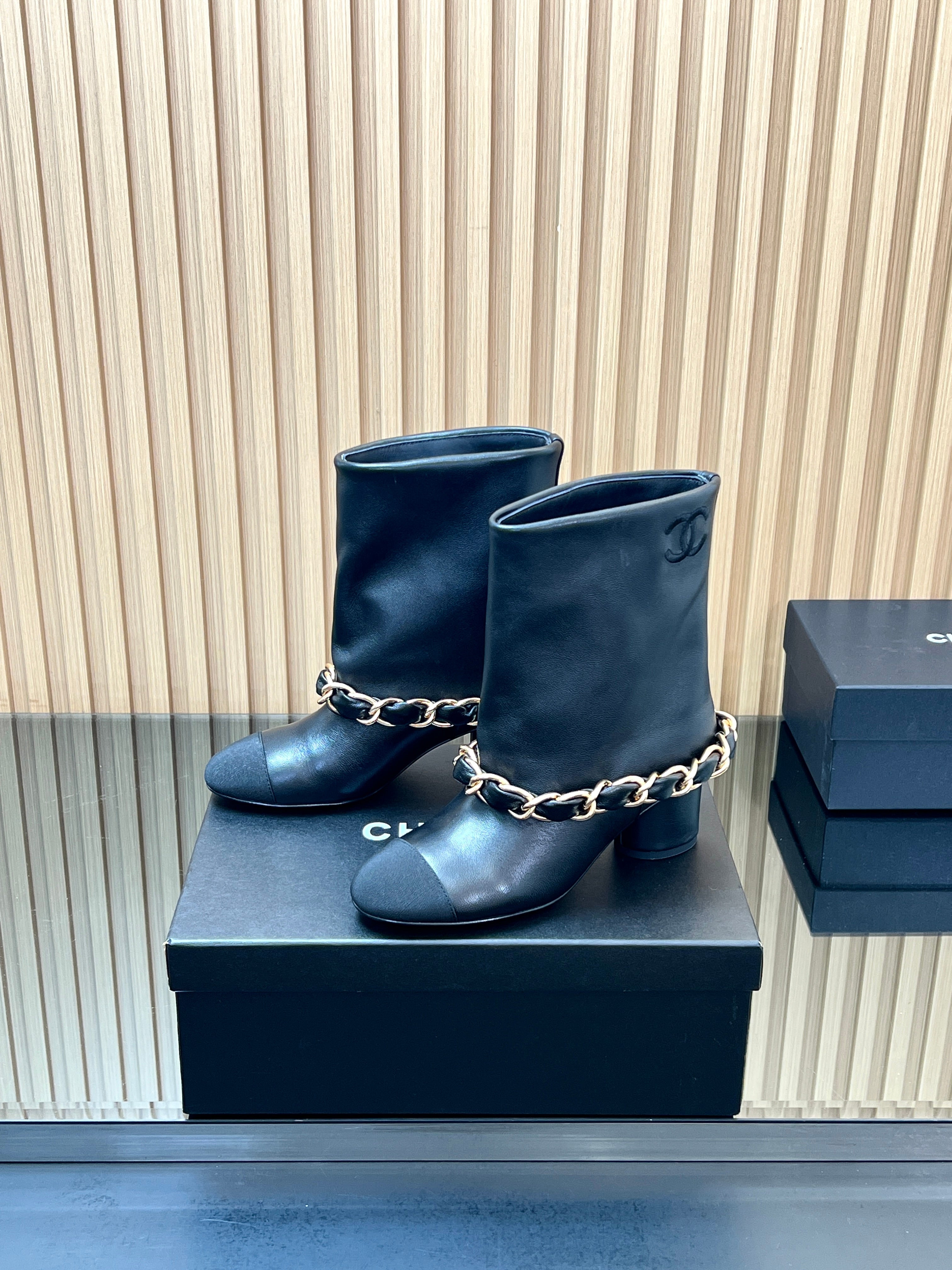 CHANEL 25S LOW BOOTS 65MM IN BLACK CALFSKIN GOLD HARDWARE