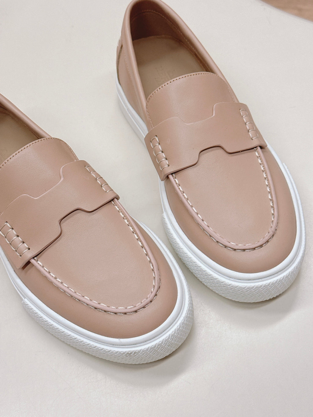 HERMES 25S SLIP-ON IN SOFT NUDE PINK LAMBSKIN