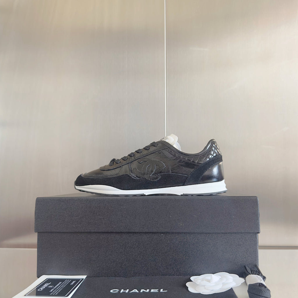 CHANEL 25S SNEAKERS 20MM IN BLACK GLOSSY CALFSKIN
