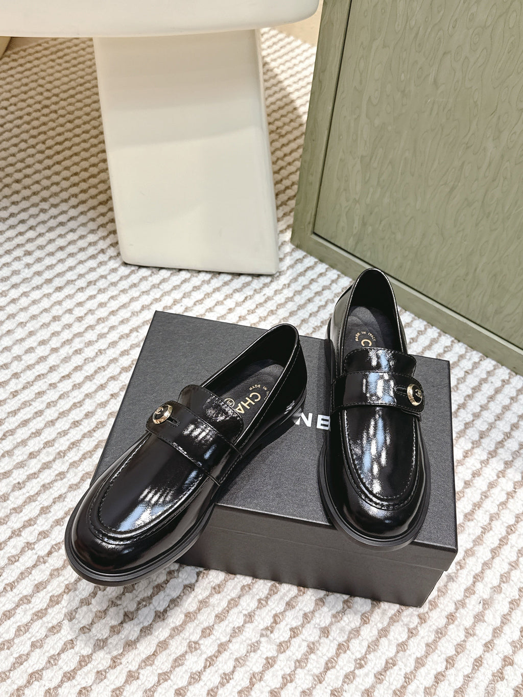 CHANEL 25S GODDESS FLAT LOAFERS IN BLACK PATENT CALFSKIN GOLD HARDWARE