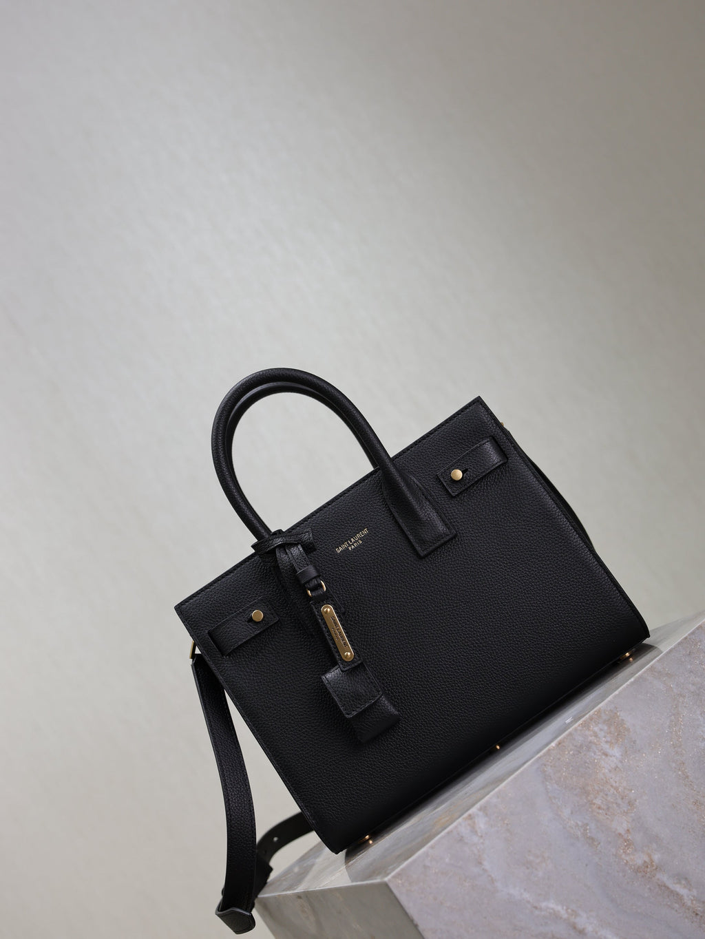 YSL 25S SAC DE JOUR MM 26 IN BLACK SUPPLE GRAINED CALFSKIN GOLD HARDWARE