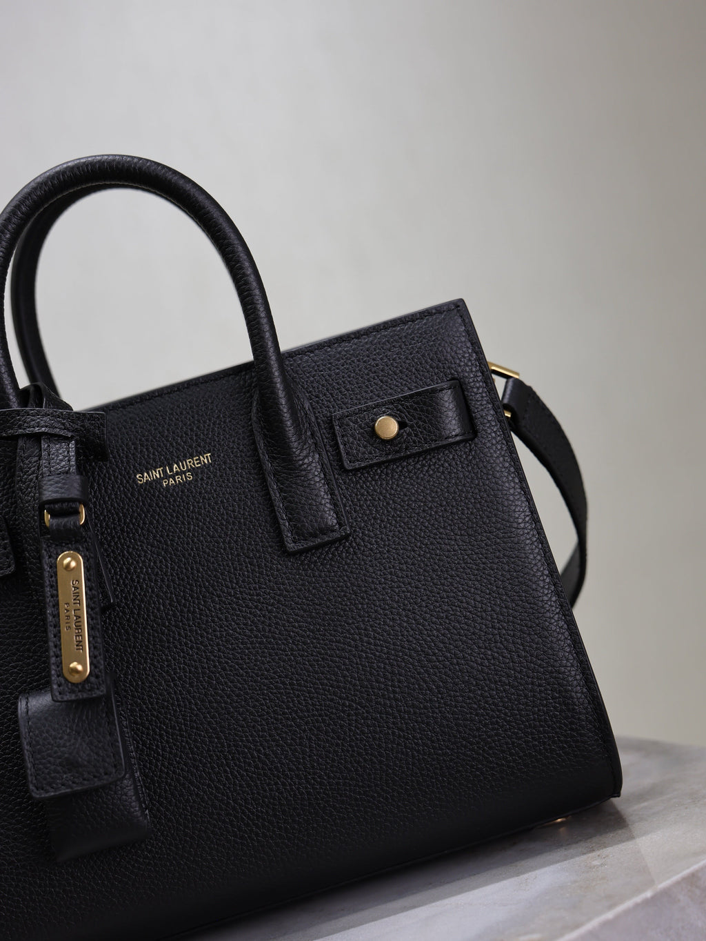 YSL 25S SAC DE JOUR 22 IN BLACK SUPPLE GRAINED CALFSKIN GOLD HARDWARE
