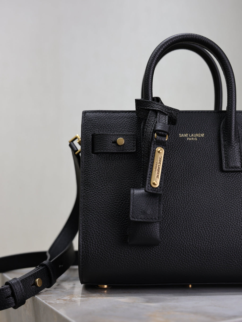 YSL 25S SAC DE JOUR 22 IN BLACK SUPPLE GRAINED CALFSKIN GOLD HARDWARE
