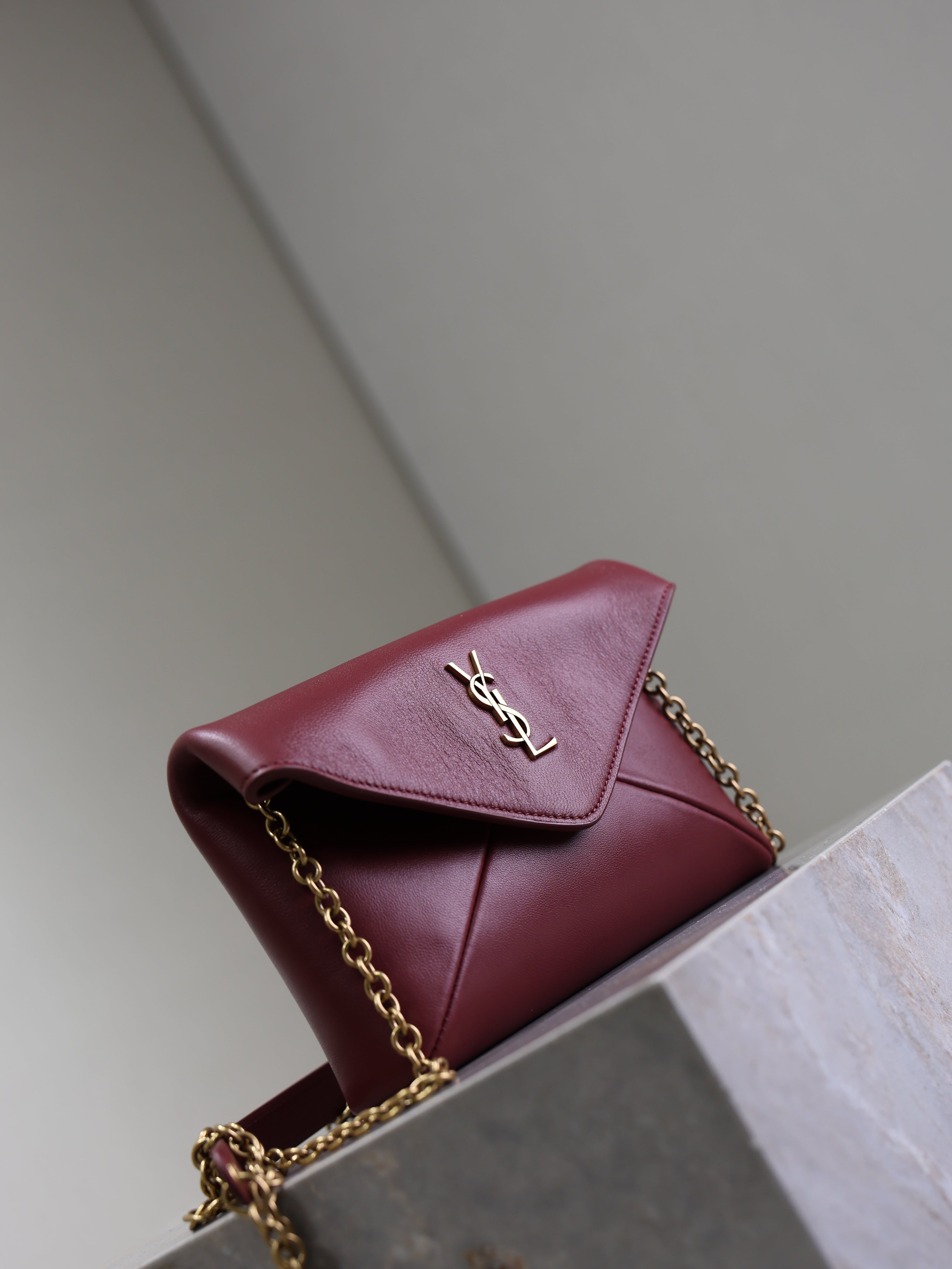YSL 25S CALYPSO MINI 19 IN BURGUNDY CALFSKIN GOLD HARDWARE